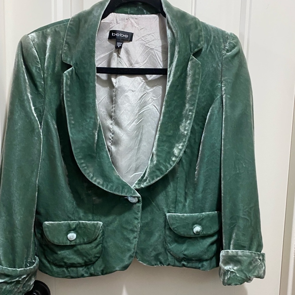 Bebe stylish jacket size 10 jade in color